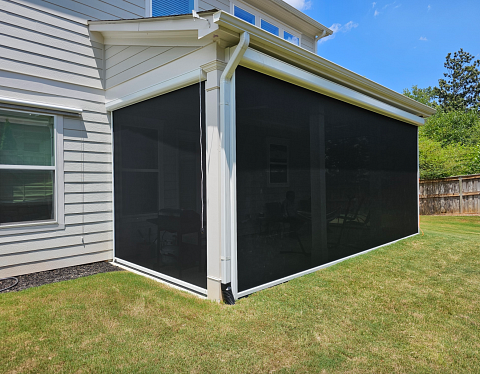 Motorized patio screens for summer shade