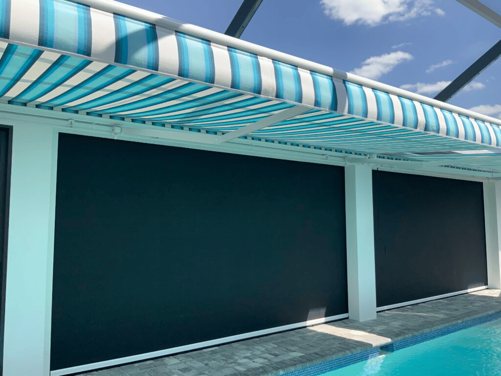 Outdoor screens and retractable awning installed on a patio, designed for long-term durability